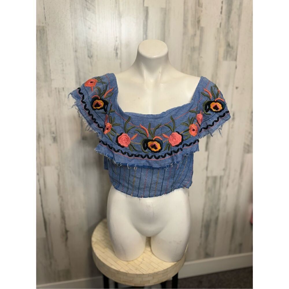 Blue blouse off the shoulders